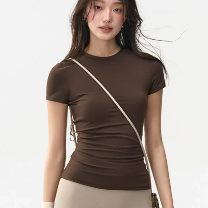 OEM Yoga Top Manufacturer producing premium custom short sleeve yoga tops for global activewear brands.